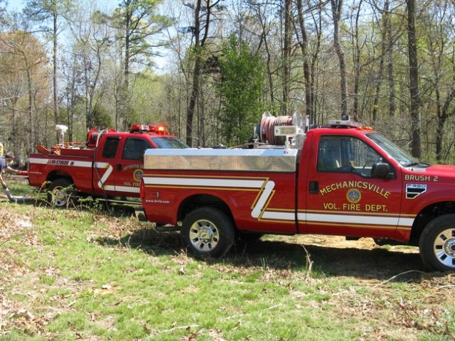 Brush 2 on a debris fire in Clements